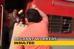 On Camera, Railway Officer In UP Throws Biscuits At Migrants, Abuses Them On Camera, Railway Officer In UP Throws Biscuits At Migrants, Abuses Them