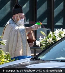 Viral: Priest Sprays Holy Water From Toy Gun To Maintain Social ...