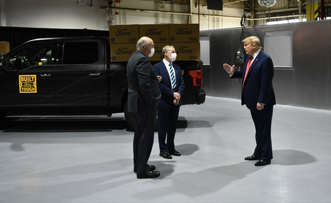 Trump Refuses To Wear Mask In Front Of Cameras, Says "Had One On Before"