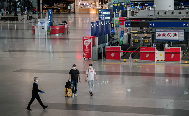 Over 1,200 Flights Cancelled In Beijing Amid Fear Over New Virus Outbreak