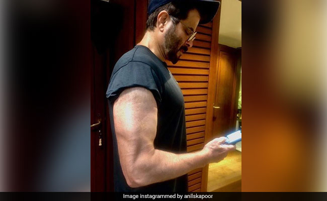 What Do You Think Anil Kapoor Is Doing In This Pic - "Texting Or Flexing?"