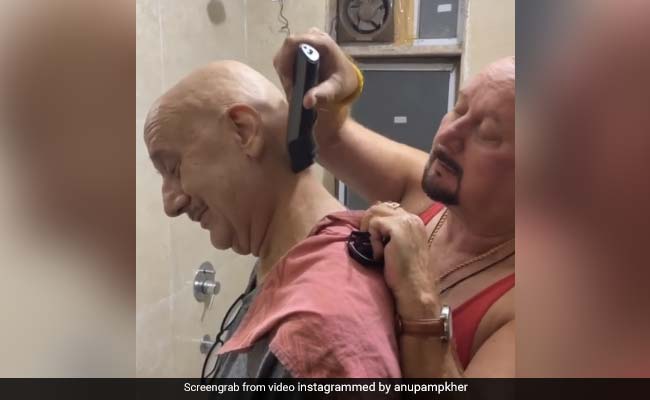 Anupam Kher Gets A Quick Haircut From Brother Raju Kher. See Their ROFL Video