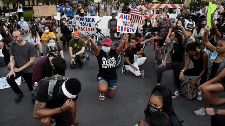 FBI Fires Agents Photographed Kneeling During 2020 Racial Justice Protest