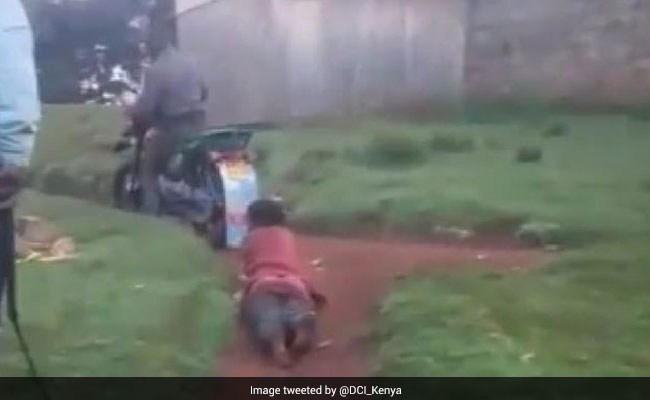 Woman Dragged Behind Bike By Kenya Cops For Alleged Theft, 3 Arrested