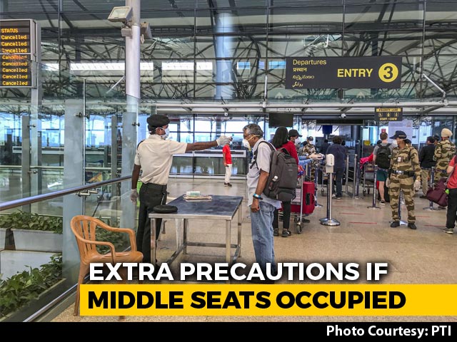 Keep Middle Seats Empty Or Give "Wrap-Around Gowns", Airlines Told