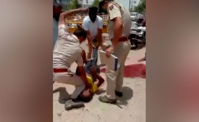 On Camera, Rajasthan Cop Pins Down Man Using Knee In Fight Over Mask