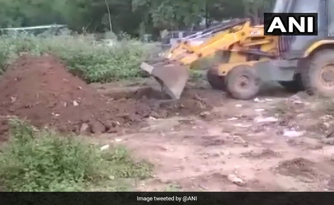 Inquiry Ordered Over Earthmovers Used To Dispose Coronavirus Bodies