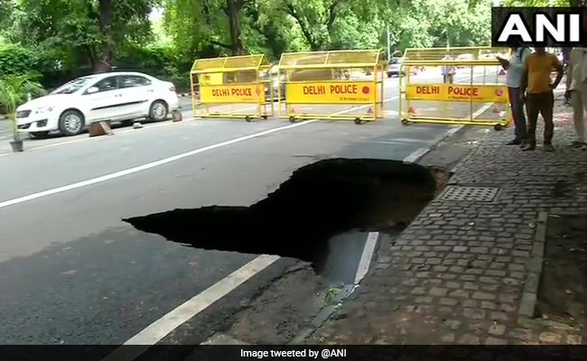 Road In Heart Of Delhi Caves In After Heavy Rain, Flooding In Many Areas