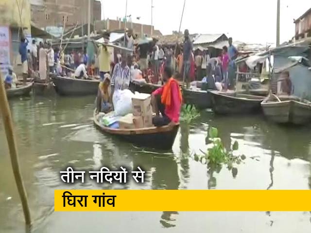 बिहार बाढ़: तीन नदियों से घिरे गांव के लोगों को नाव भी नसीब नहीं