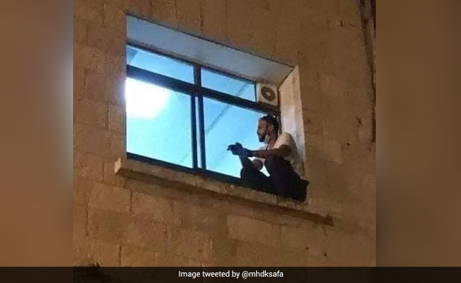 He Scaled A Hospital Wall To Say Goodbye To His Mother, Who Died Of COVID