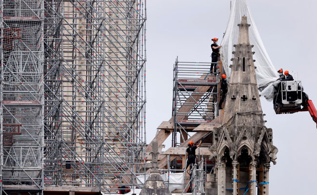 France's Notre-Dame Cathedral To Be Rebuilt As It Was Before Inferno