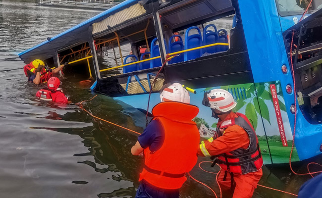 21 Killed After Bus Falls Into Lake In China