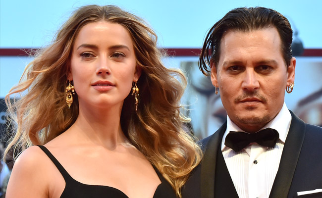 Johnny Depp Denies Claims He Hit Ex-Wife Amber Heard