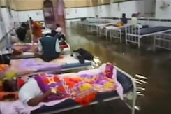 Patients Wade Through Rainwater In Hyderabad's Flooded Osmania Hospital Patients Wade Through Rainwater In Hyderabad's Flooded Osmania Hospital