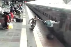 Man Nearly Crushed Under Train, Saved By Alert Security Personnel | NDTV Beeps Man Nearly Crushed Under Train, Saved By Alert Security Personnel | NDTV Beeps
