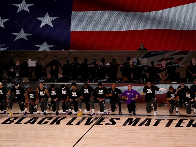 Players Take A Knee As NBA Restarts In Florida