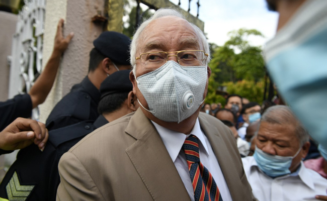 Malaysian Ex-PM Najib Razak Guilty Of All Charges In First 1MDB Trial