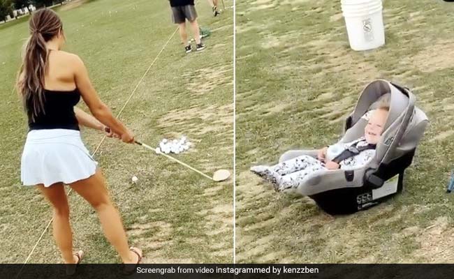 गोल्फ खेल रही मां ने मारा ऐसा शॉट, देखते ही चीख मारकर हंसने लगा बच्चा... देखें Viral Video