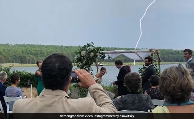Groom Makes A Joke About 2020 - Right Before Lightning Strikes. Watch