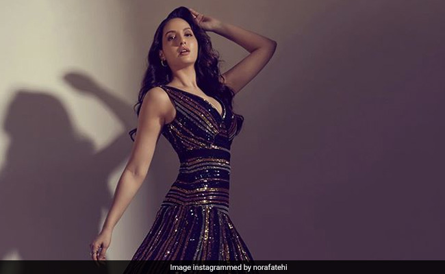 नोरा फतेही ब्लैक शिमरी ड्रेस में आईं नजर, Photos देख आप भी कहेंगे Wow