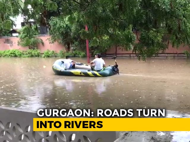 Boat On Waterlogged Road, Submerged Underpasses: Rain Paralyses Gurgaon