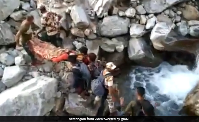 Security Personnel Carry Woman For 15 Hours In Uttarakhand Rescue Operation
