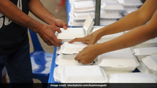 Stranger Disguised As Batman Delivers Meals To Homeless People In Santiago
