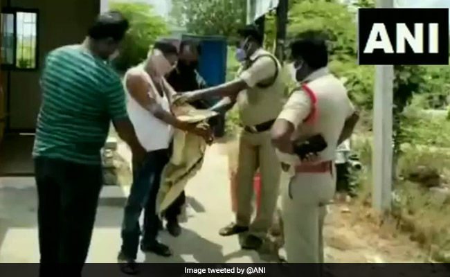Man Arrested With 47 Liquor Bottles Stuck To His Body With Tape In Andhra