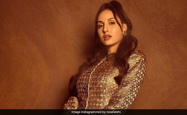 Nora Fatehi&rsquo;s Metallic Skirt Suit Is Setting Work Wear Goals