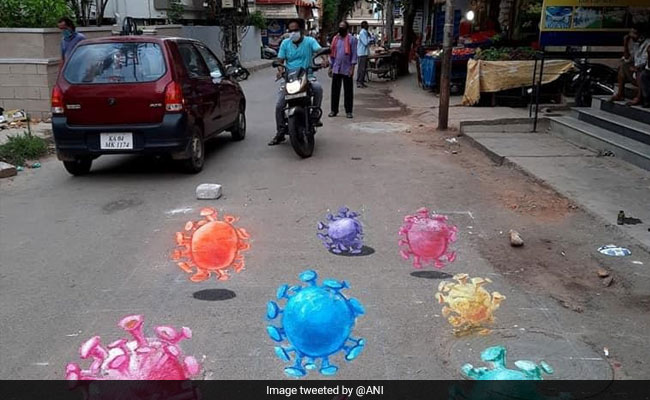 Artist Creates Paintings On Bengaluru Streets For COVID-19 Awareness