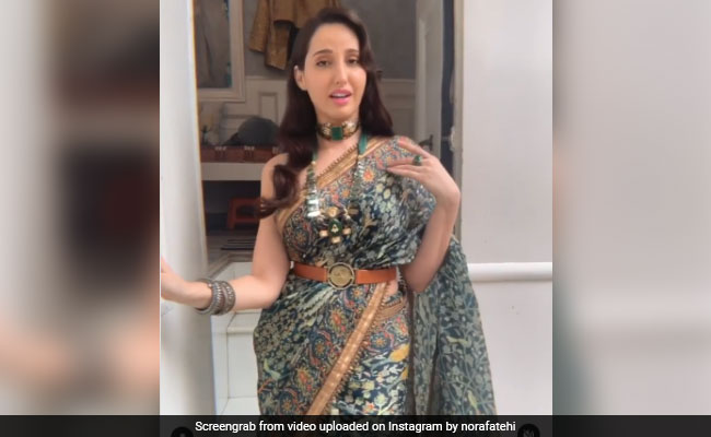 साड़ी पहनकर 'वैनिटी वैन' से निकल रही थीं नोरा फतेही, कैमरा को देखते ही... देखें VIDEO