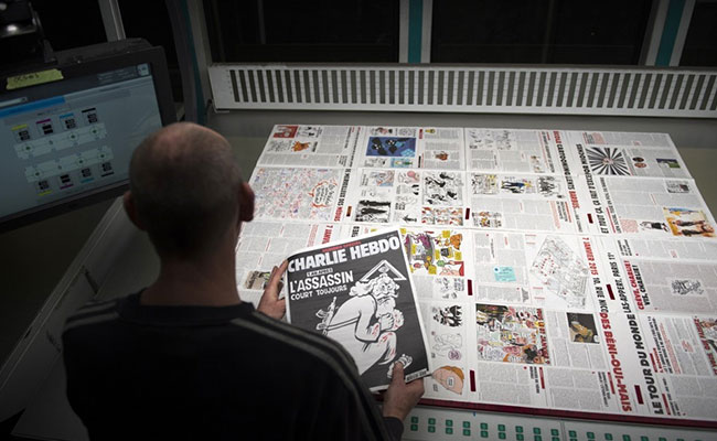 Charlie Hebdo Attack Victims Honoured As Iran Fumes Over New Cartoons