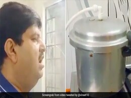 Watch: Man Uses Pressure Cooker To Inhale Steam, Netizens Debate Over Video Watch: Man Uses Pressure Cooker To Inhale Steam, Netizens Debate Over Video