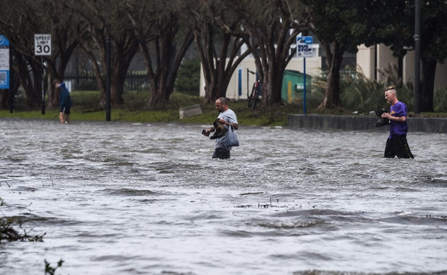 Hurricane Sally Weakens To Tropical Storm, "Catastrophic Flooding" Continues In US
