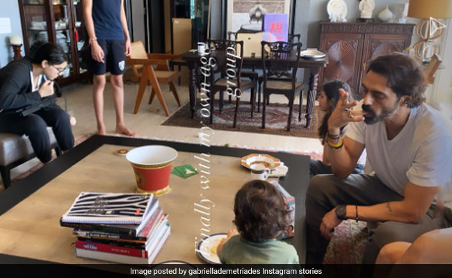 A Scene From Arjun Rampal And Gabriella Demetriades' Living Room, With Arik, Mahikaa And Myra