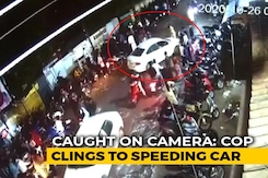 Caught On Camera: Cop Clings To Speeding Car's Bonnet In Madhya Pradesh Caught On Camera: Cop Clings To Speeding Car's Bonnet In Madhya Pradesh