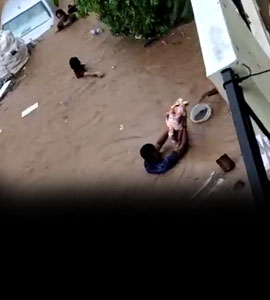  On Camera, Bengaluru Men Save Children As Heavy Rain Floods Streets 