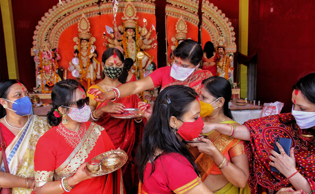 Durga Puja Ends, <i>Sindur Khela</i> In Masks, Rituals In PPE Kits. See Pics