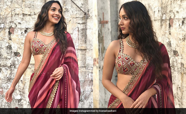 Kiara Advani Sets Festive Fashion Goals Soaring In A Stunning Red And Gold <i>Lehenga Saree</i>