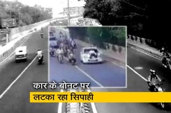 ट्रैफिक पुलिसकर्मी को कार के बोनट पर 400 मीटर तक घसीटा ट्रैफिक पुलिसकर्मी को कार के बोनट पर 400 मीटर तक घसीटा