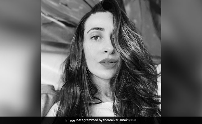 We Spy Karisma Kapoor&rsquo;s Clear Skin And Wavy Hair That Is No Short Of Perfect
