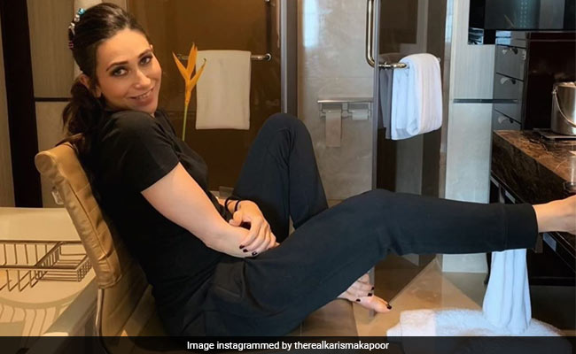 Karisma Kapoor Hopes For &ldquo;Carefree Days&rdquo; As She Lounges In All-Black