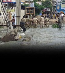 Watch: Daring Rescue In Hyderabad To Save Man Swept Away By Flood Watch: Daring Rescue In Hyderabad To Save Man Swept Away By Flood