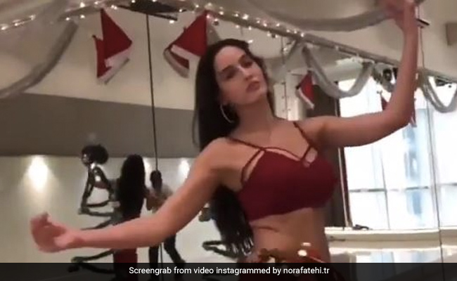 नोरा फतेही ने 'स्वैग से स्वागत' गाने के अरेबिक वर्जन पर किया धमाकेदार बेली डांस, रेड आउटफिट में देखें Video