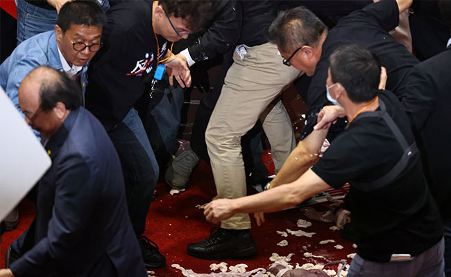 Pig Guts Fly In Taiwan Parliament In Dispute Over US Pork Imports