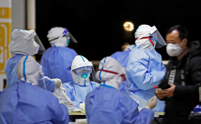 Shanghai Tackles Coronavirus Outbreak, Hundreds Of Flights Cancelled