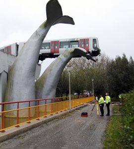 Tram Runs Off Track, Plunges And Lands On A Statue