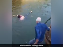 Watch: British Diplomat Saves Drowning Woman In China Watch: British Diplomat Saves Drowning Woman In China