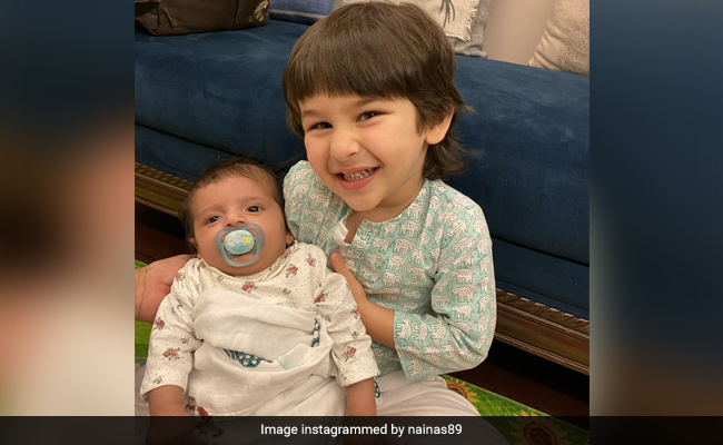 The Internet Can't Stop Gushing Over This Adorable Pic Of Taimur Holding A Baby