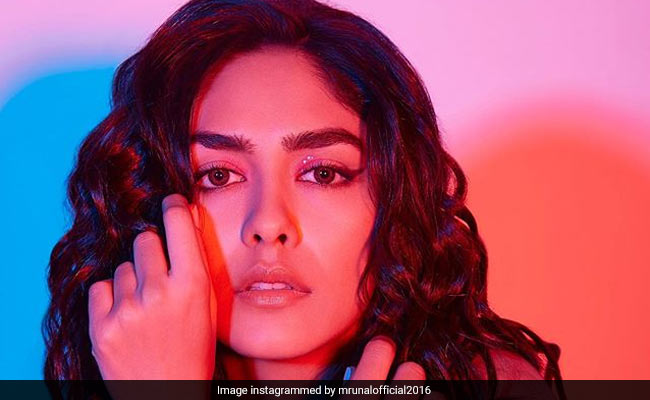 Mrunal Thakur's Glittering Eye Makeup And Shiny Curls Set Diwali Makeup Goals
